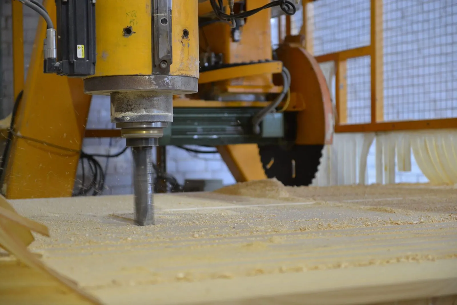 Machining a timber panel on a CNC machine